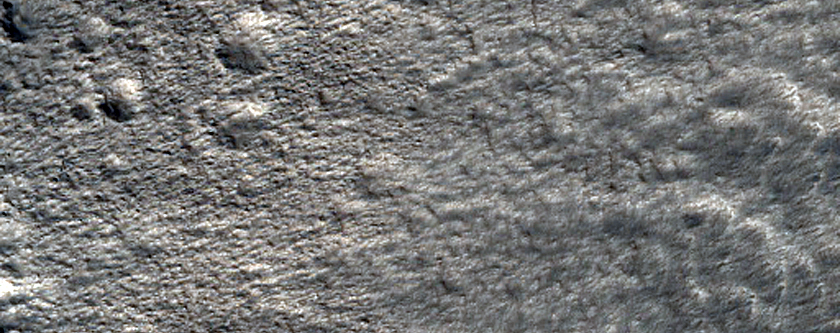 Well-Preserved Small Impact Crater on Northern Plains