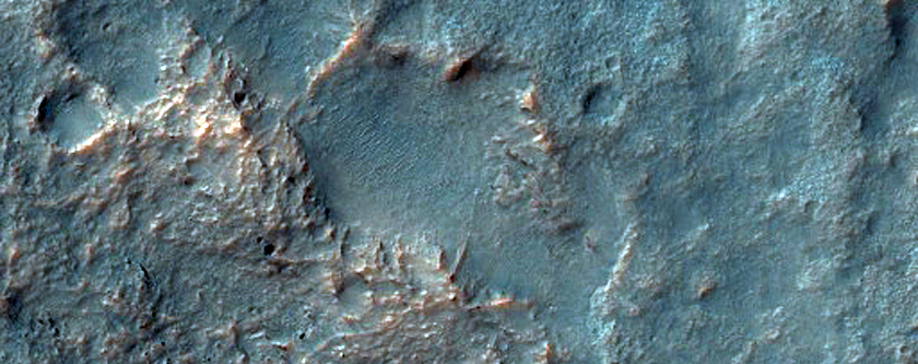 Possible Prehnite and Smectite-Rich Terrain North of Hellas Planitia