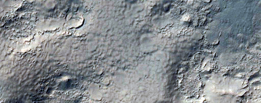 Well-Preserved 7-Kilometer Crater with Gullies and Bedrock