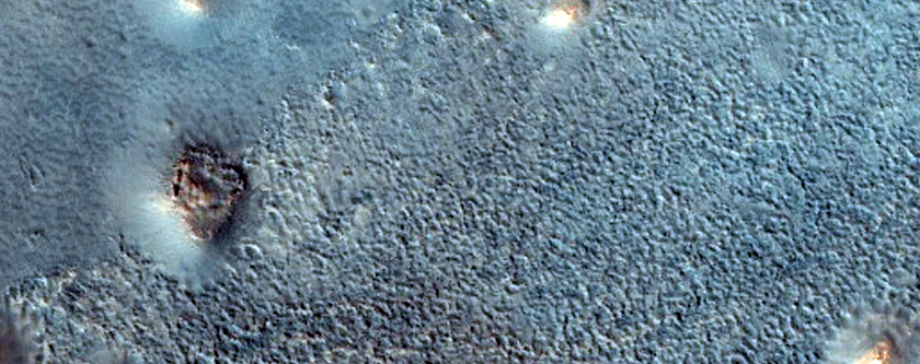 Contact between Materials of Contrasting Albedo