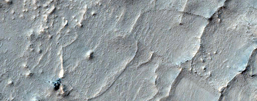 Rocky Crater Floor Deposit with System of Ridges