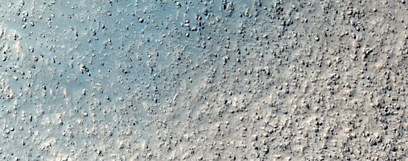 Layered Mesa-Forming Material in Crater Southeast of Hellas Planitia
