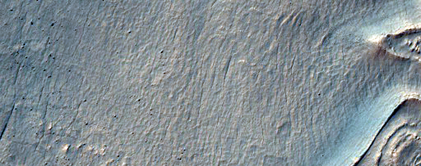 Concentric Arcuate Ridges at Base of Crater Walls