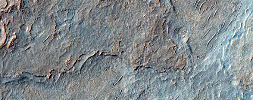 Rugged Banded Material in Crater in Northwest Hellas Planitia