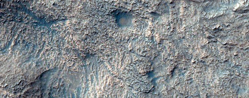Clay-Bearing Layered Deposit in Unnamed Crater North of Proctor Crater