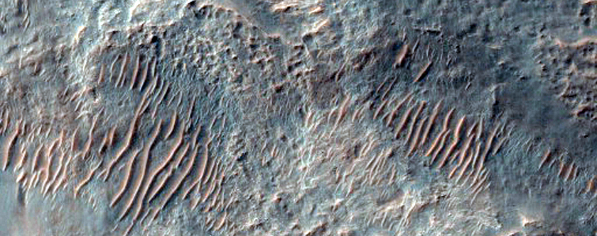 Monitor Slope Features Near Crater Rim