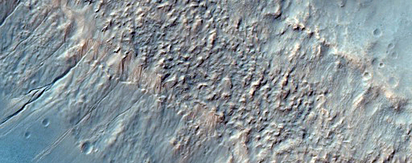 Straight and Narrow Gullies with Light-Toned Apron Material
