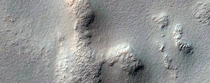 Greater Terra Sirenum Crater Rim or Escarpment