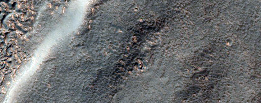 Viscous Flow Features Near Hellas Montes