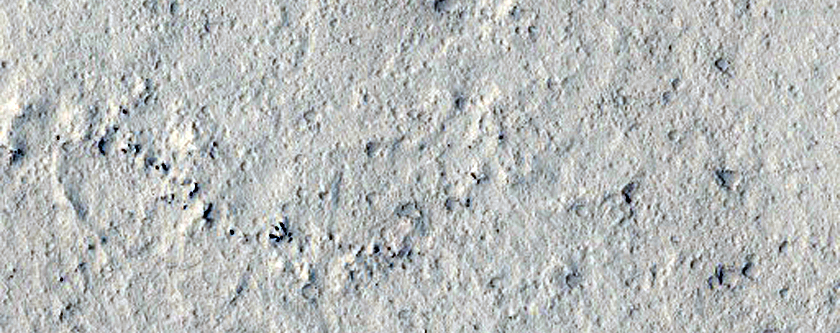 Chain of Elliptical Pits in Cerberus Fossae as Seen in MOC Image E05-01457