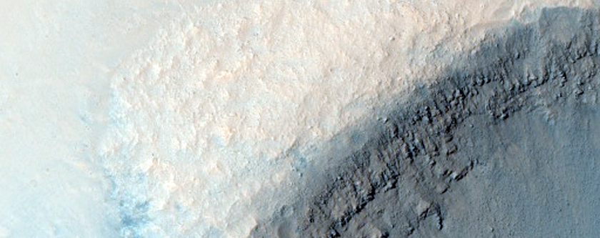 Crater with Interior Bedforms and Exposed Wall Strata