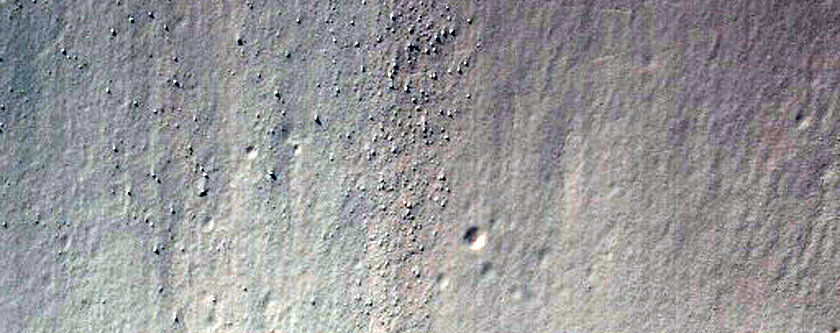 Small Crater in Mantled Material