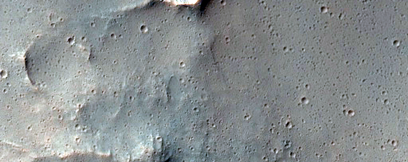 Surface Texture and Small Crater Population in Valley Network Mantle