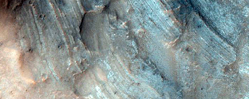 Tilted and Faulted Layers in Oudemans Crater