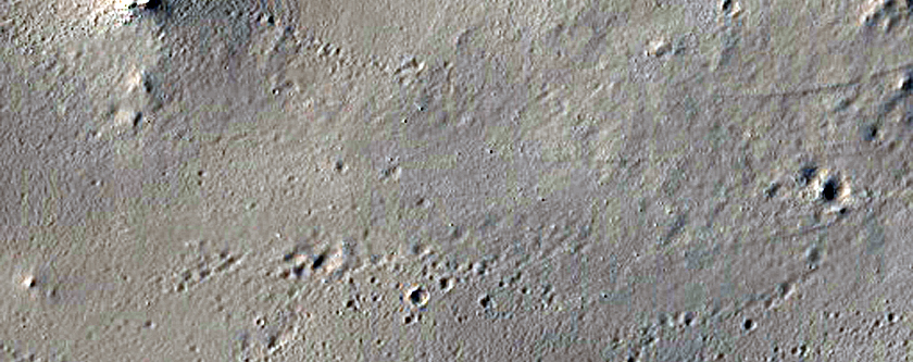 Ejecta from Crater Immediately East of This Location