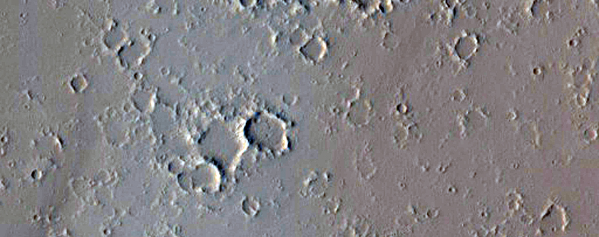 Pit Crater Chains and Cross-Cutting Graben in Tractus Catena