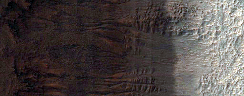 Gullies in Crater Wall, As Seen in MOC Images E13-00774 and S11-02343