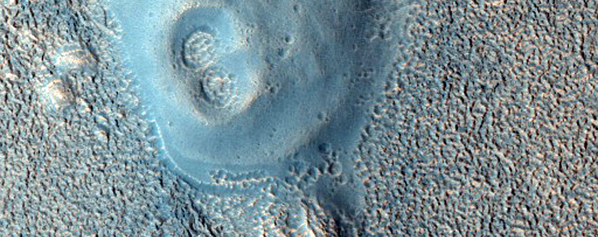 Dark Crater-Topped Cones in Cydonia Region