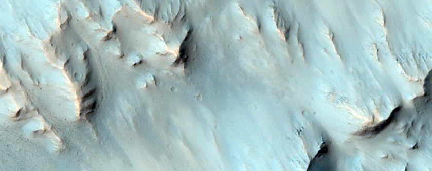 Gullies on Outward-Facing Raised Crater Rim, As Seen in MOC Image R15-01511