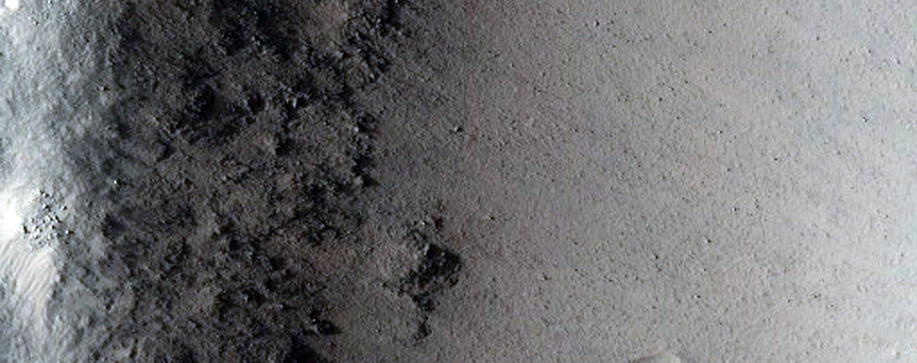 Crater Ejecta Wrapped Around Raised Rim of Smaller Crater 