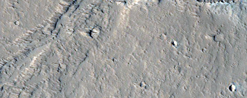 Low Shield with Elongate Summit Depression in North Tharsis 