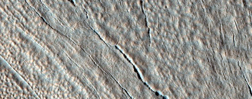 Layered Deposits within an Impact Crater in Utopia Planitia 