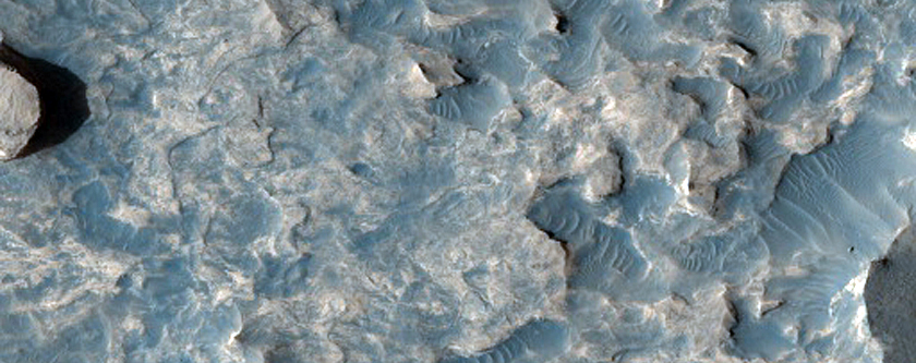 Dark-Toned Unit Exposed in Ejecta Blanket
