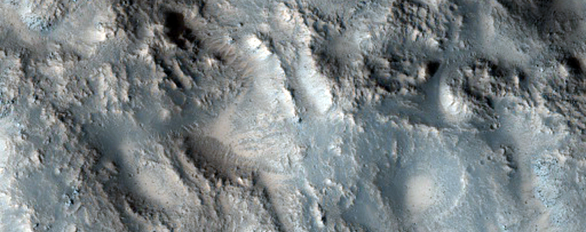 Impact Crater Cutting Wrinkle Ridge in Eastern Tempe Terra 