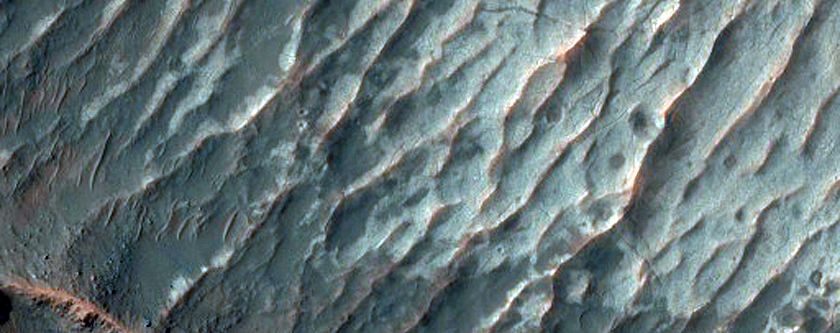Relatively Dust Free Lavas from Arsia Mons