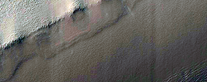 Exposure of Polar Layered Deposits Not Observed by Mars Global Surveyor