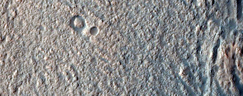 Glacial-Like Features in Unnamed 6-Km Diameter Drater