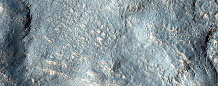 Reull Vallis: Junction of Tributary and Main Valley.
