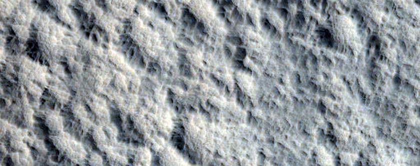 Unnamed Fresh Crater with Ponded Pitted Materials