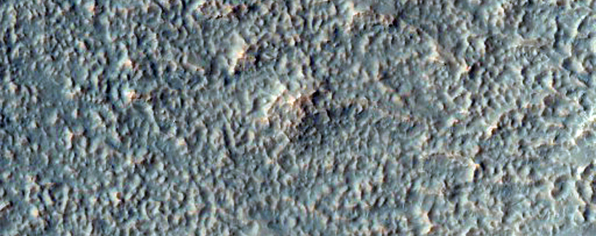 Eroded Ponded and Pitted Materials in Unnamed Crater 