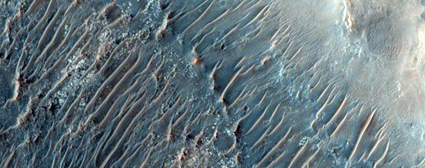 Odd Layered and Eroding Crater Fill in Deeply Eroded Craters