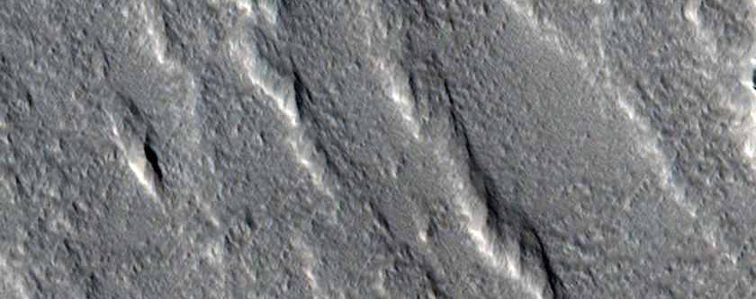 Possible Ice Sheet Cutout from Old Lava Flow in Olympus Mons Region