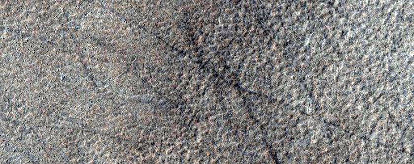 Scarp and Patterned Ground West of Malea Planum