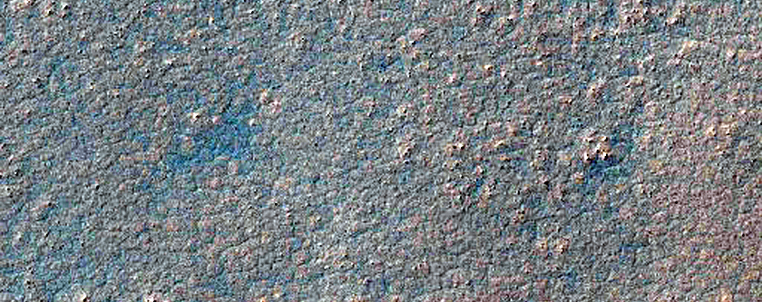 Chain of Small Pits in Southern Aonia Terra