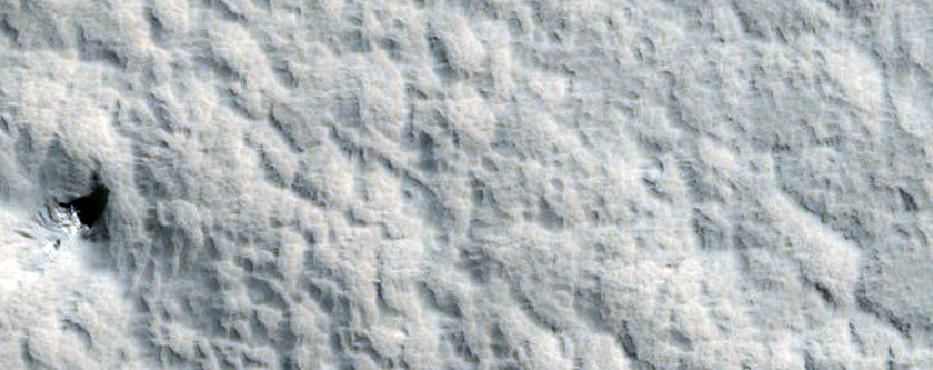 Unnamed Fresh Crater with Ponded Pitted Materials