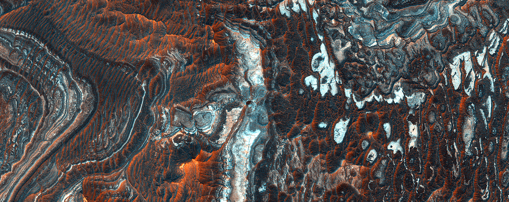 Inverted Channels and Layers near Juventae Chasma