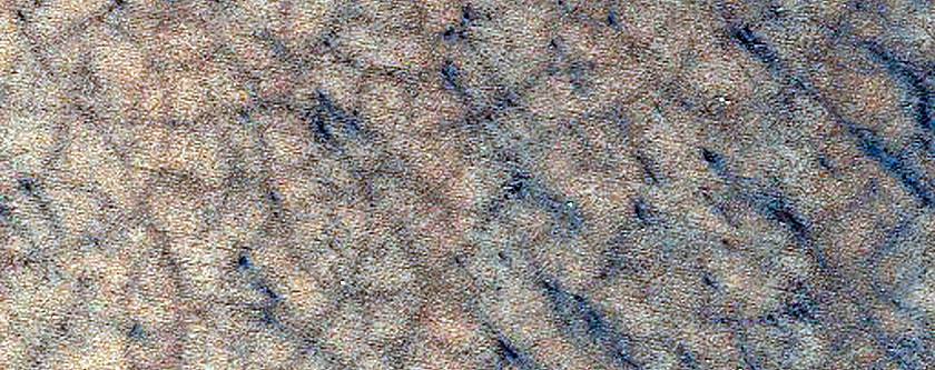 Possible Exposure of Polar Layered Deposits in Area Not Before Well-Imaged