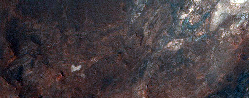 Light-Toned Materials in Complex Central Uplift of Unnamed Crater