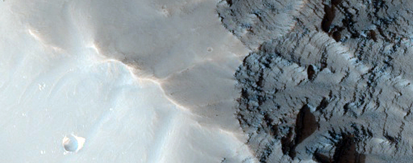 Layering along Oudemans Crater Wall