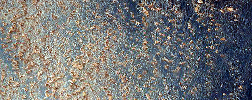 Unit of High Thermal Inertia and Low Albedo in Western Valles Marineris
