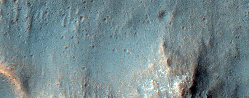 Gullies with Dark Channels on South-Facing Crater Slope