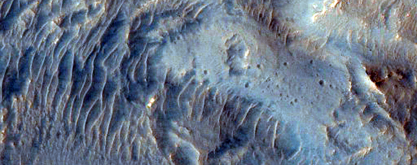 Ius Chasma and Landslide Deposits Therein