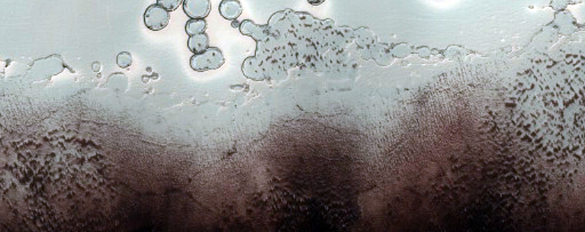 Exposure of South Polar Layers and Residual Cap Edge