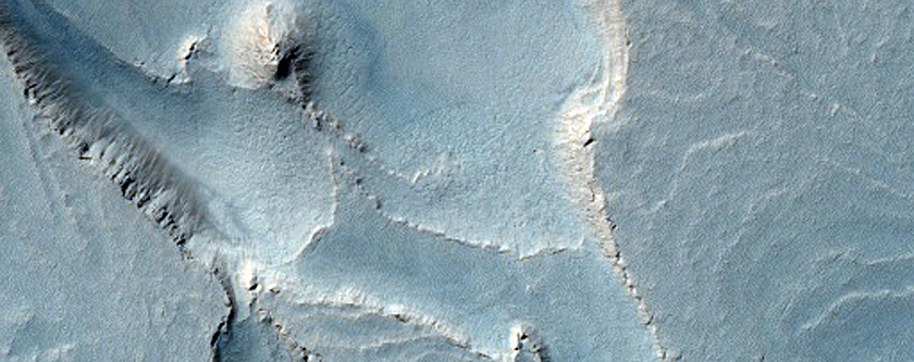 Spallanzani Crater - Swirl Patterns in Lower Layers along Northern Margin