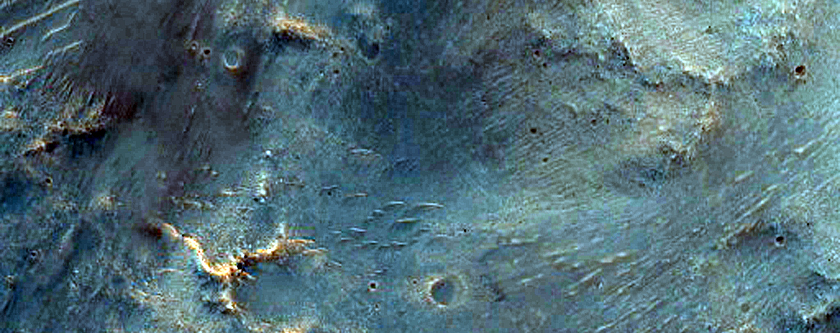A Terraced Fan and Valley in a Crater