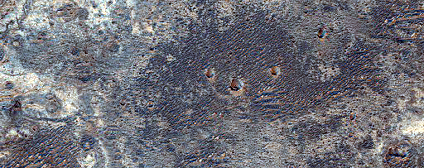 Light-Toned Layering along Plains Southwest of Melas Chasma